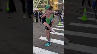 Michigan couple kiss at finish line after winning 2024 Detroit Free Press marathon [upl. by Arman]