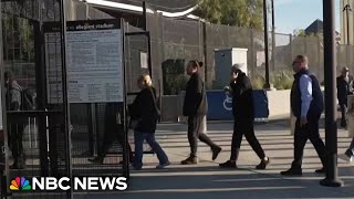 Voters wait in long lines in battleground states of Arizona and Nevada [upl. by Levan]