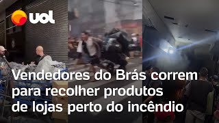 Incêndio no Brás Vídeos mostram correria de vendedores para recolher produtos de lojas [upl. by Ennalyrehc859]