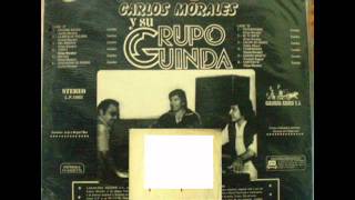 GRUPO GUINDA MIL AMORES Canta CARLOS PALOMINOwmv [upl. by Ardnat105]