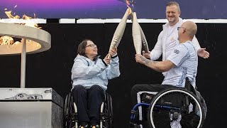 Paralympians light the flame at the birthplace of the games in England [upl. by Werra337]