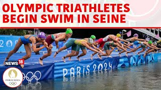 Olympic Triathletes Swim In Seine River After Days Of Concerns About Water Quality  N18G  News18 [upl. by Jayson]