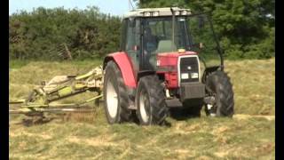 Massey Ferguson 6170 with Claas rake [upl. by Enitsirk]