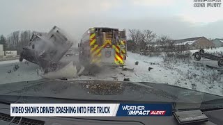 Firefighters jump out of the way as a box truck loses control and slams into firetruck on I94 [upl. by Tuddor]