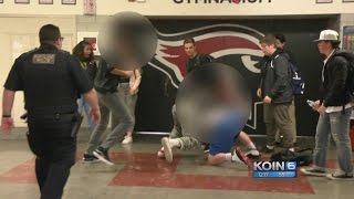 Watch School Officer breaks up Lincoln HS fight [upl. by Lyrradal]