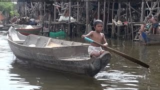 Kampong Phluk A floating village on Cambodias Tonle Sap Lake [upl. by Leuas]