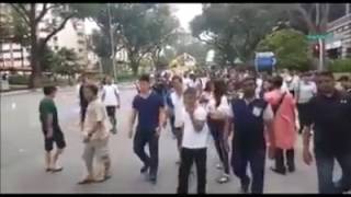 Gang members shout party numbers 369 at funeral in Singapore [upl. by Ayikur]