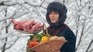 Cooking tandoori lamb with saffron and vegetables on a snowy winter day [upl. by Burty]