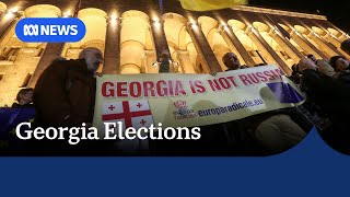 Georgia opposition protests election claiming Russian inteference  ABC NEWS [upl. by Adnirem489]