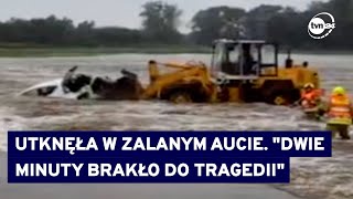 Kobieta utknęła w samochodzie zalewanym przez wodę Uratował ją sąsiad z koparką TVN24 [upl. by Baler]