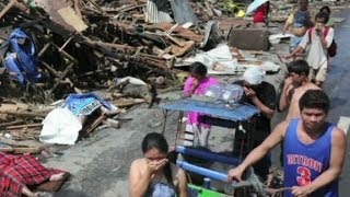 Typhoon Haiyan leaves Tacloban in ruins [upl. by Birkner846]