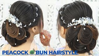 peacock feather hairstyle peacock 🦚 bun hairstyle how to make peacock feather hairstyle [upl. by Roselani]