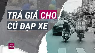 Đạp người chở hàng ngã sõng soài trên đường Hành vi côn đồ sẽ bị xử lý ra sao  VTC Now [upl. by Swerdna]