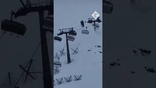 Ski lift passengers rush to safety as strong winds toss gondolas into the air in Italy [upl. by Ortensia]