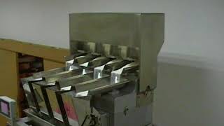 Big Four Heads Linear Weigher working with vertical packaging machine [upl. by Anil]