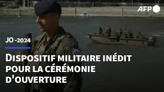 JO2024 un dispositif militaire inédit pour sécuriser la cérémonie douverture  AFP [upl. by Eerhs]