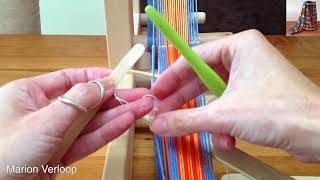 Pebble weaving part I putting in the string heddles [upl. by Dorkas]