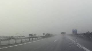 Video Stürmischer Wind und sehr starker Regen Brücke über Nord Ostsee Kanal Deutschland footage [upl. by Nairadas]