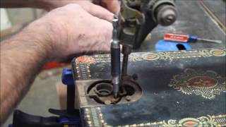 Breaking Loose Stubborn Screws in Rusty Old Sewing Machines [upl. by Mears291]