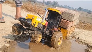 Pani se bhare hue khet mein se nikal rahe hain HMT 5911 tractor ko inton se Bhari Hui trolley [upl. by Eetnahc]