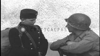 Hungarian schoolboys are interviewed by American soldiers of US 11th Armored DivHD Stock Footage [upl. by Lahtnero]