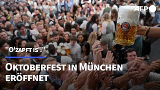 quotOzapft isquot Oktoberfest in München eröffnet  AFP [upl. by Feltie]