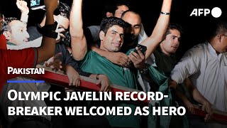 Pakistan welcomes back Olympic javelin recordbreaker Arshad Nadeem  AFP [upl. by Monia]