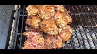 Seasoned Crispy Chicken Thighs over Charcoal BBQ [upl. by Htrowslle]