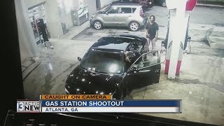 A gas station shootout in Atlanta caught on camera [upl. by Eissirhc247]