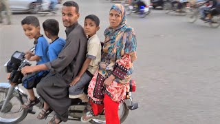 🇵🇰 🏍 KARACHI PAKISTAN WALKING TOUR 😱 5 PEOPLE ON 1 MOTORBIKE 😱 KARACHI CITY WALK KARACHI TRAFFIC [upl. by Uyr]