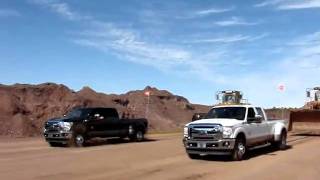 2011 Ford Super Duty pulls 100000 pound Caterpillar 988F Wheel Loader [upl. by Silverman501]