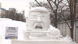 Trump ice sculpture unveiled at Japans Sapporo snow festival [upl. by Ardnuhs884]