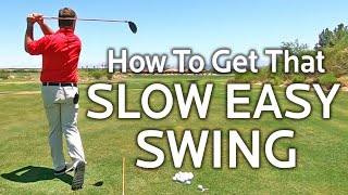 HOW TO GET A SLOW EASY GOLF SWING [upl. by Enelec]