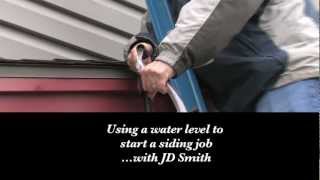 JD Smith  How to Use a Water Level to Start a Vinyl Siding Job  Reese Tips ytv200c [upl. by Einnol924]