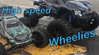 traxxas X MAXX v2 8s vs E revo brushless edition 6s lots of wheelies [upl. by Kania935]