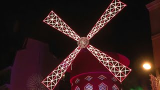 Pariss Moulin Rouge inaugurates new windmill sails in style  AFP [upl. by Pelage95]