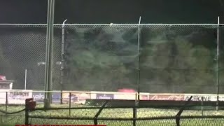 Race car flips over through fence at Volusia Speedway [upl. by Golda]