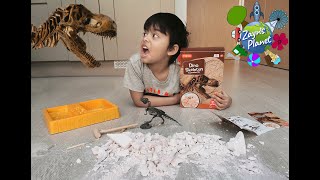 Dino Skeleton Excavation Kit  Zayn digging dinosaur bones using a hammer chisel and magnifier [upl. by Ulric]