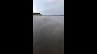 Powerful winds sweep across Northern Irish beach [upl. by Serena24]