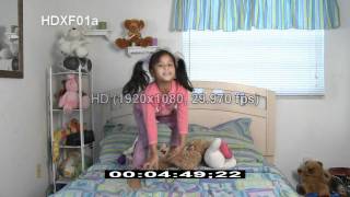 Litle Girl Jumping On Bed  Best Shot Footage  HD Stock Footage [upl. by Suckram]