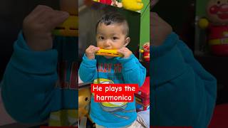 He knew how to play the harmonica baby 🇯🇵🇵🇭 musicinstruments cute [upl. by Ikik6]