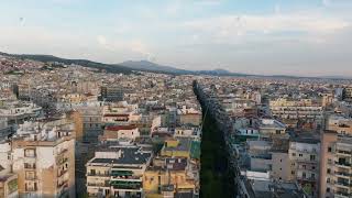 Aerial views of Thessaloniki Greece showcase a vibrant cityscape Urban buildings and streets [upl. by Deryl]