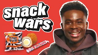 Arsenal Star Bukayo Saka Rates British And Nigerian Food  Snack Wars [upl. by Adrianna390]