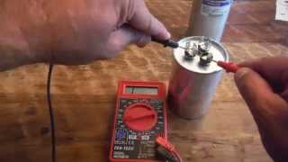 How to test a Dual Run Capacitor from Air Conditioner with a Multimeter [upl. by Lissie484]