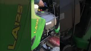 How to change a Battery on a John Deere Lawn Tractor mower 100 Series [upl. by Elleon]