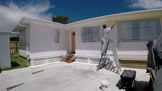 Primer Undercoat on weatherboard housepainters spraypainting maskingtape [upl. by Savdeep662]