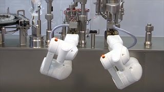 Filling and closing machine for small batches with Stäubli TX60 stericlean robots [upl. by Sanyu228]