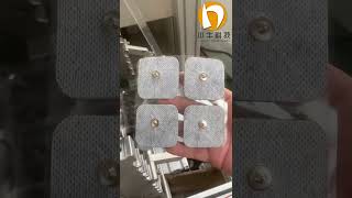 Buttoning process for Tens Electrode Patches Welcome to get machine details machine factory [upl. by Yelhsa]