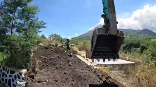 Excavators work to level the land at a new tourist attraction [upl. by Hersch774]