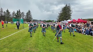 Drum Major leads Ballater Pipe Band playing Cabar Feidh on march during 2024 Dufftown Highland Games [upl. by Kwon631]